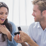 A woman smiles at her partner as they pull out a ring. Learn how a premarital counselor in Phoenix, AZ can offer support by searching premarital counselor near me today. A therapist in Arcadia, AZ can help you today!
