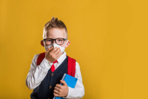 An image of a child with a a mask and glasses on. A child therapist in Phoenix, AZ can offer support for gifted and challenged children. Learn more about therapy in Arcadia, AZ by searching child counseling Phoenix AZ today.