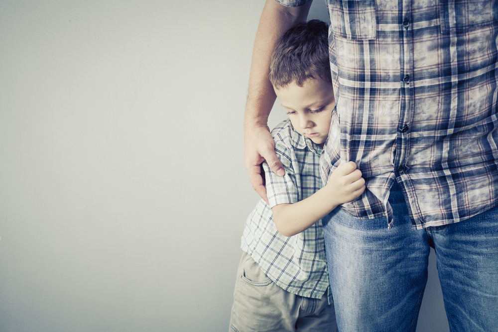 A child holds on to their parent tight. Learn how an anxiety therapist in Arcadia, AZ can offer support for you and your child. Learn more by searching for online anxiety treatment in Arcadia, AZ today.